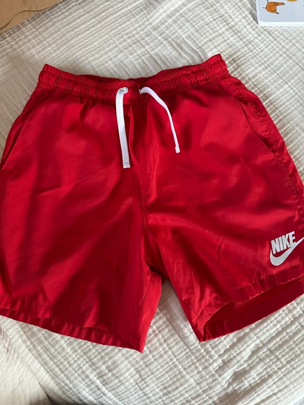 Nike Red Athletic Shorts with White Swoosh